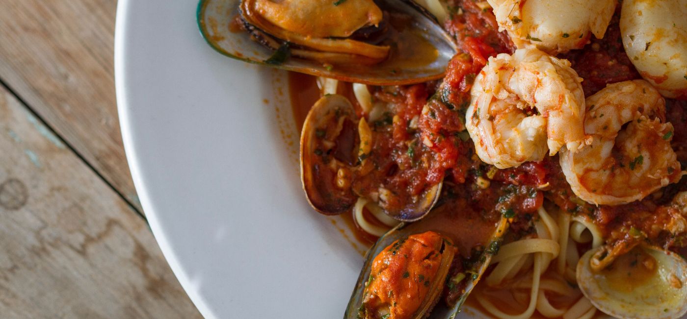 Zuppa De Pesce - Clams, Mussels, Shrimp, & Scallops, in a Red or White Sauce